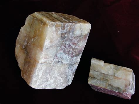 Dolomite colors - Carbonate of calcium and magnesium. Colors: Often pinkish or flesh colored, but sometimes white, gray, green, brown or black. ... Slightly harder than calcite.